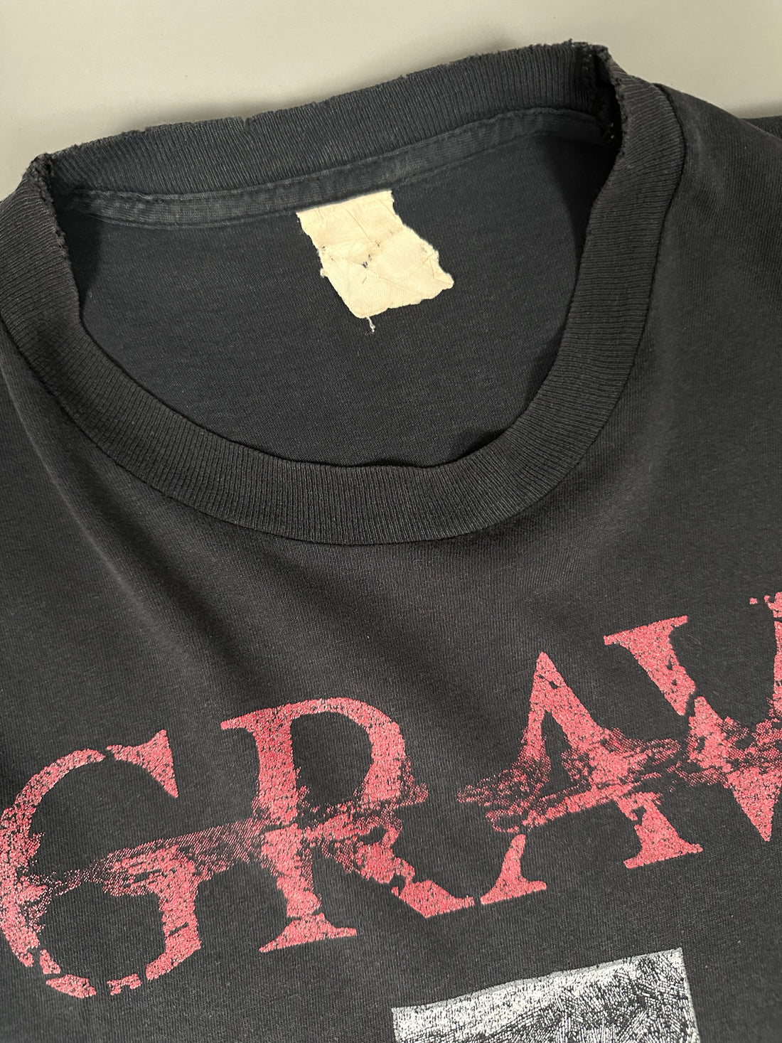 90年代ヴィンテージのグレイブノースリーブTシャツ
